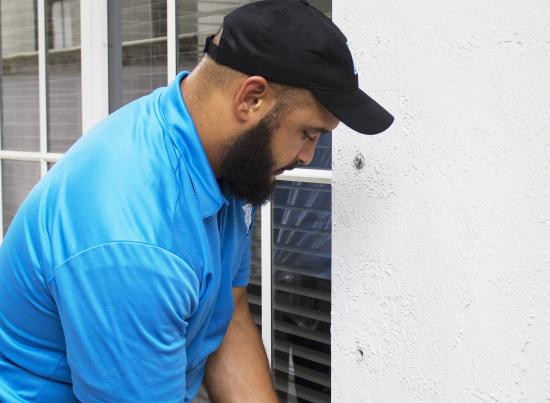 project manager removing shutter bolts