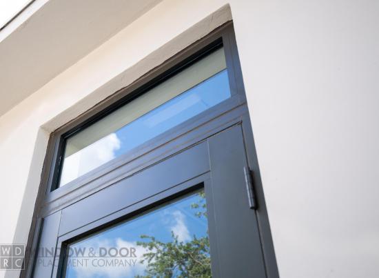 close up of a transom window above a door